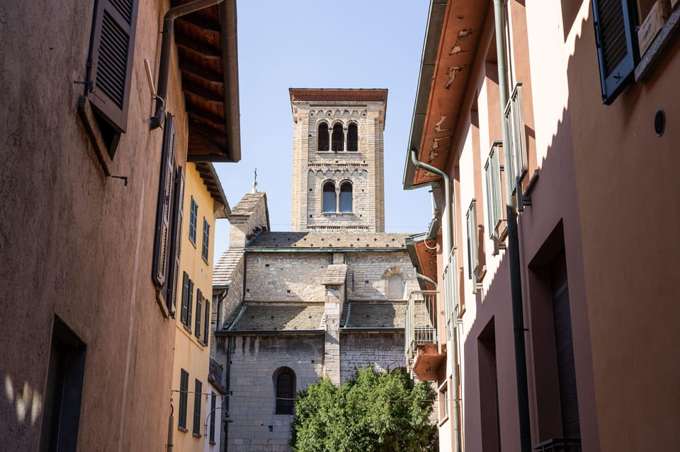 From Milan: Como, Bellagio, Lugano Day Tour & Lake Cruise - Lugano’s quick Swiss reset: shopping, old-town strolls, and a mountain backdrop