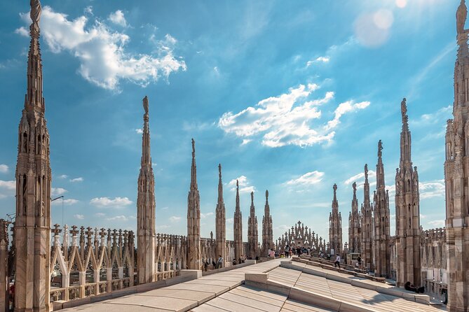 Milan: Cathedral and Duomo's Rooftop Guided Tour - Entering Milan Cathedral fast: skip-the-line value you can feel