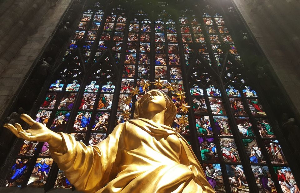 Milan: Cathedral and Terraces Guided Experience - Inside Duomo di Milano: mosaics, windows, and sculptural storytelling