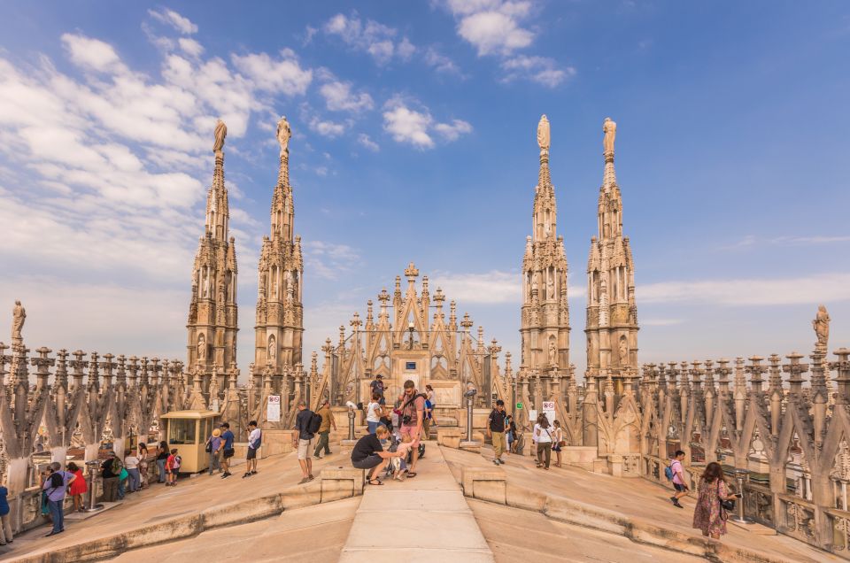 Milan: Cathedral Rooftop Tour - The roof walk: nearly 50 steps and why shoes matter