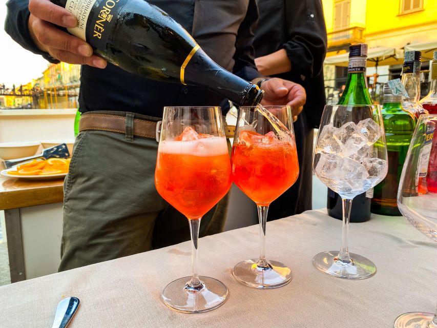 Milan: Navigli District Canal Boat Tour with Aperitivo - Darsena di Milano photo stop and Naviglio Pavese views