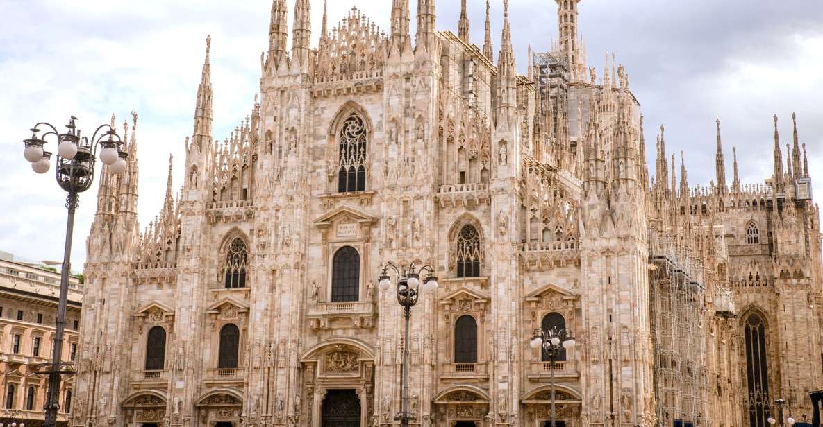 Milan: Priority Access Duomo and Rooftop Tour - Rooftop terraces: elevator up, skyline views down
