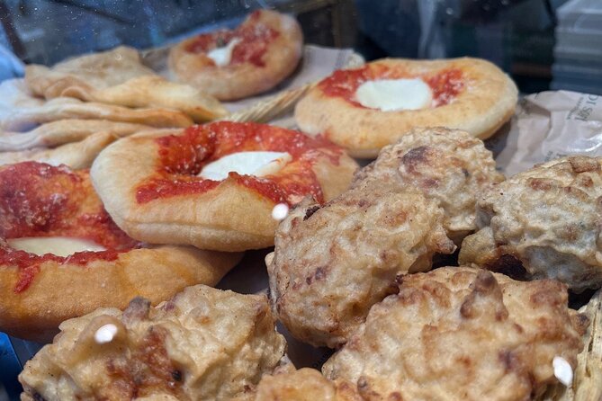 Milan's Authentic Street Food tour: A Gourmet Experience - Pickup and transport: on foot and by tram/metro, not a private car